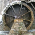 The Woodward mill showing the water wheel at full power.